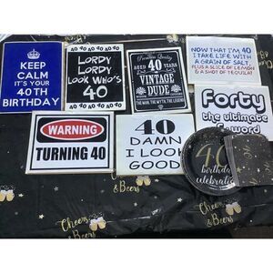40 year old birthday signs, plates, cups ,napkins, decorations